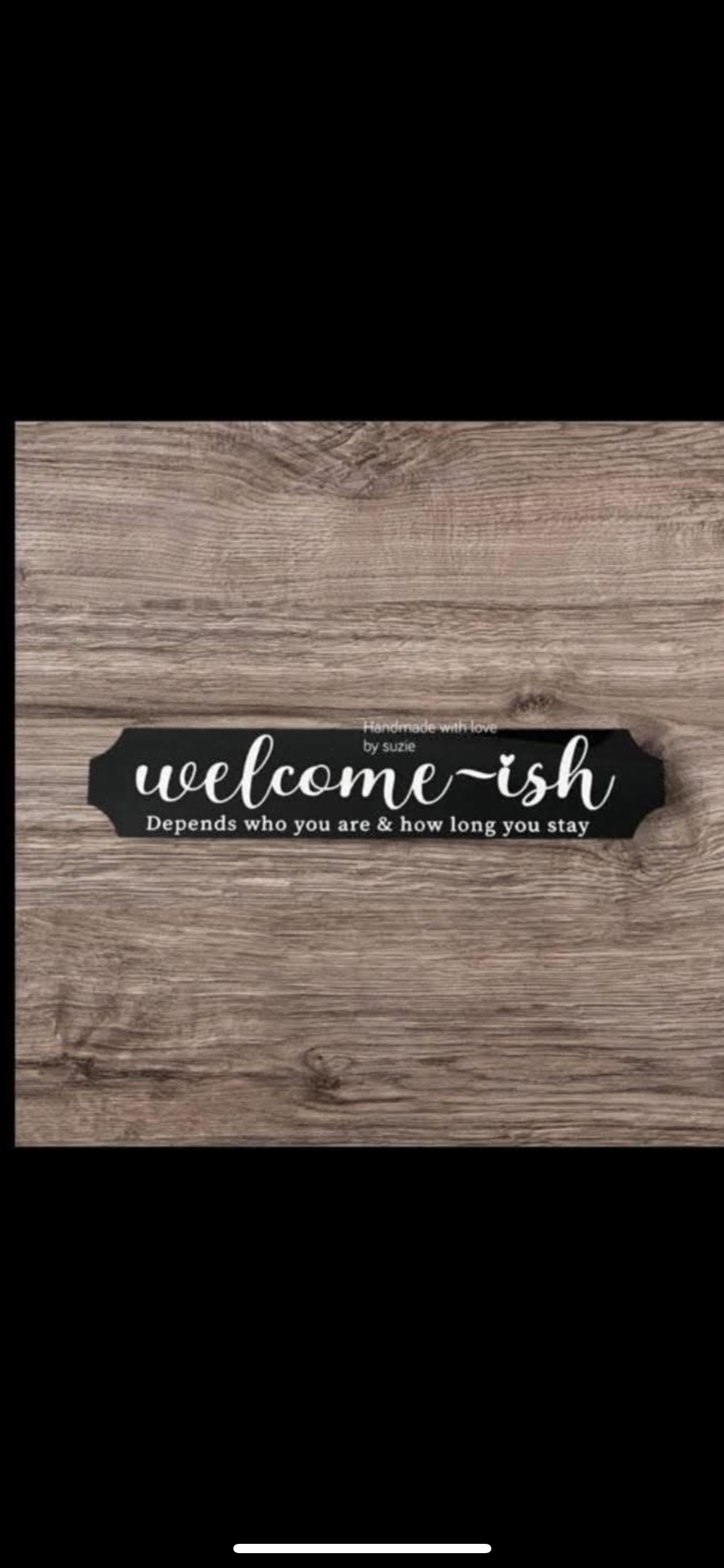 Acrylic black sign welcome-ish depends who you are
